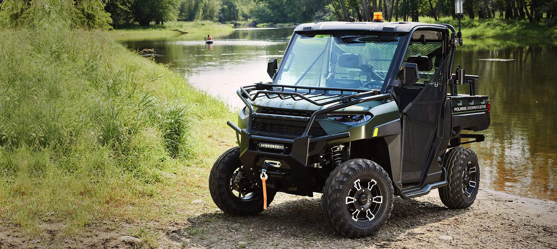 polaris ranger with a terrain and wildlife management package on a beach