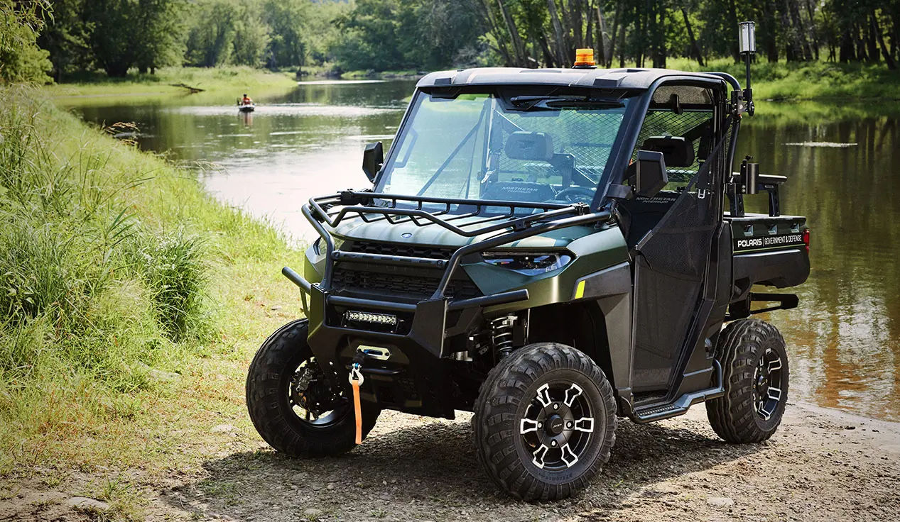 polaris ranger with a terrain and wildlife management package on a beach