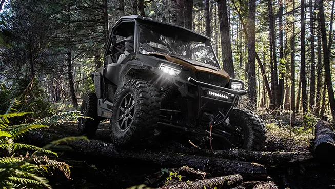 front view of a general xp 1000 side by side utv in a forest
