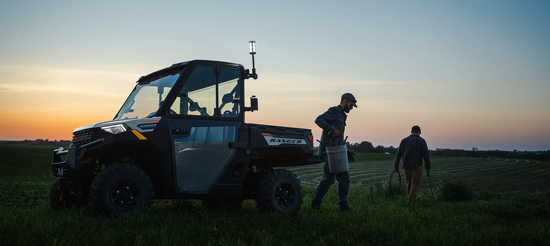 farmers fencing near their RANGER 1000 UTV