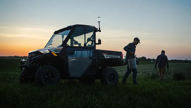 farmers fencing near their RANGER 1000 UTV