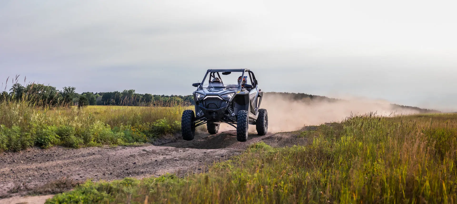 rzr pro xp side by side cruising down a trail