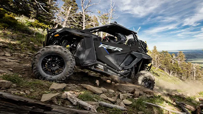 side profile of a rzr pro xp side by side on a rocky trail