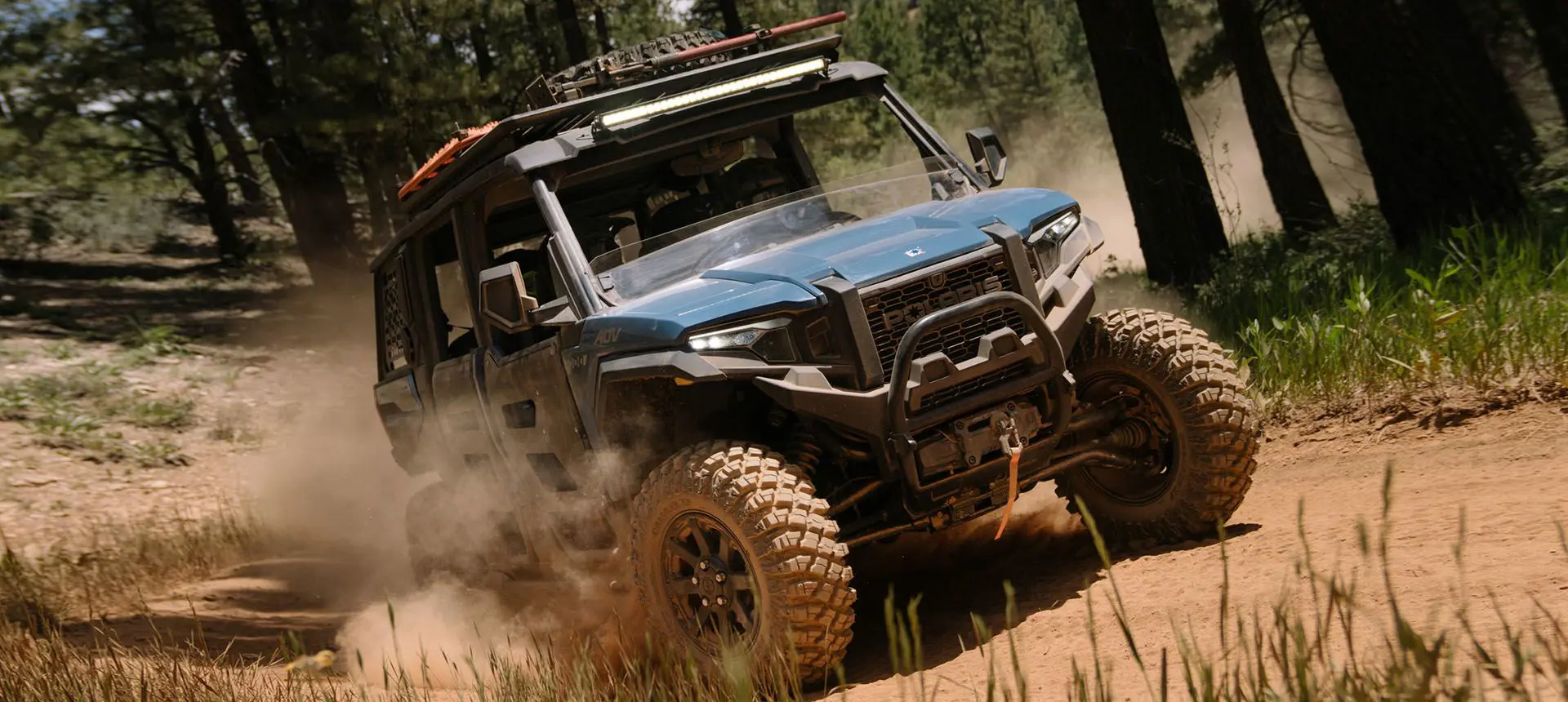 polaris xpedition adv 5 side by side on a trail