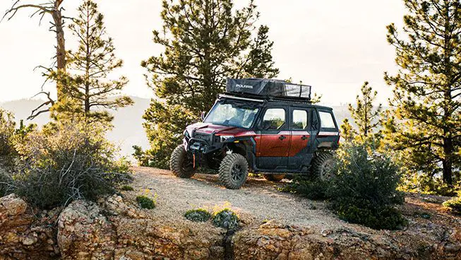 polaris xpedition adv 5 northstar side by side parked on a hill