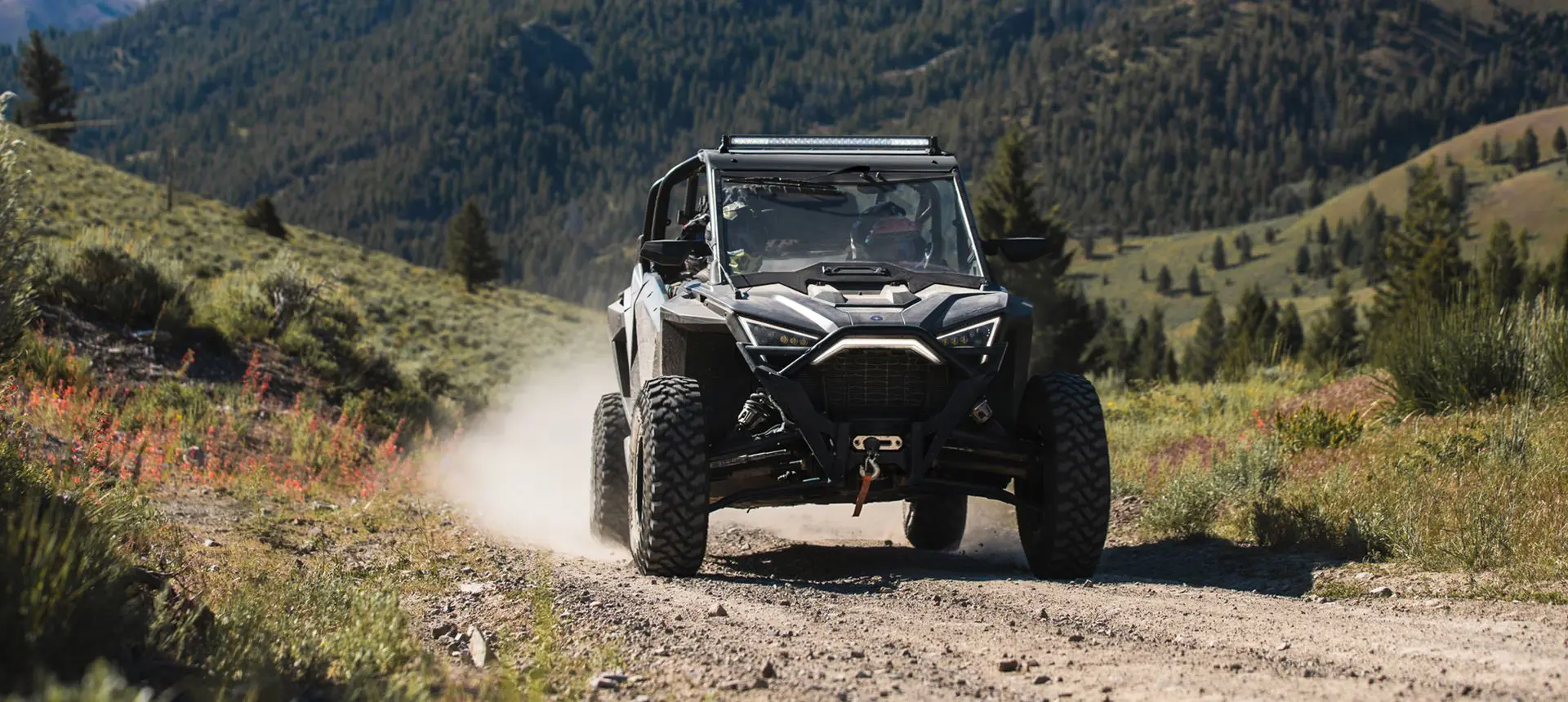 RZR Pro XP speeding on a trail