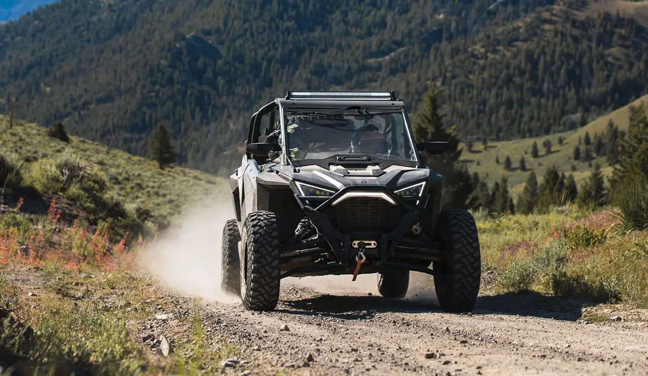 RZR Pro XP speeding on a trail
