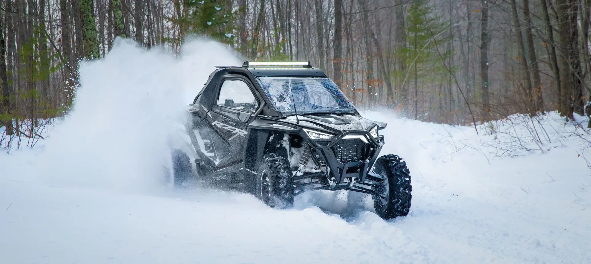 RZR Pro XP driving through the snow