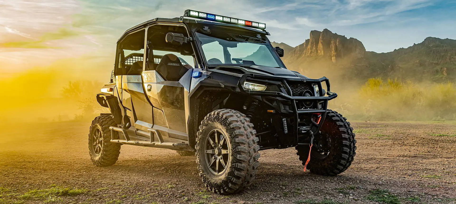 Law Enforcement GENERAL vehicle riding on a trail