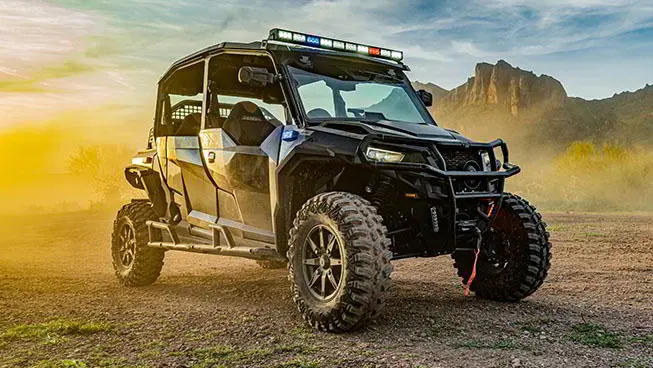 Law Enforcement GENERAL vehicle riding on a trail