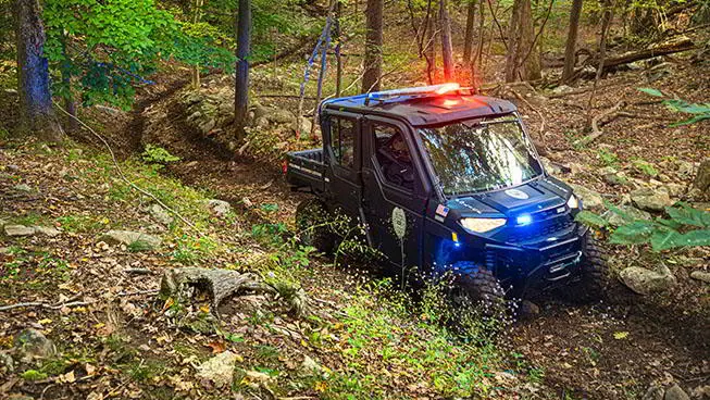 RANGER XP riding on a trail in the woods