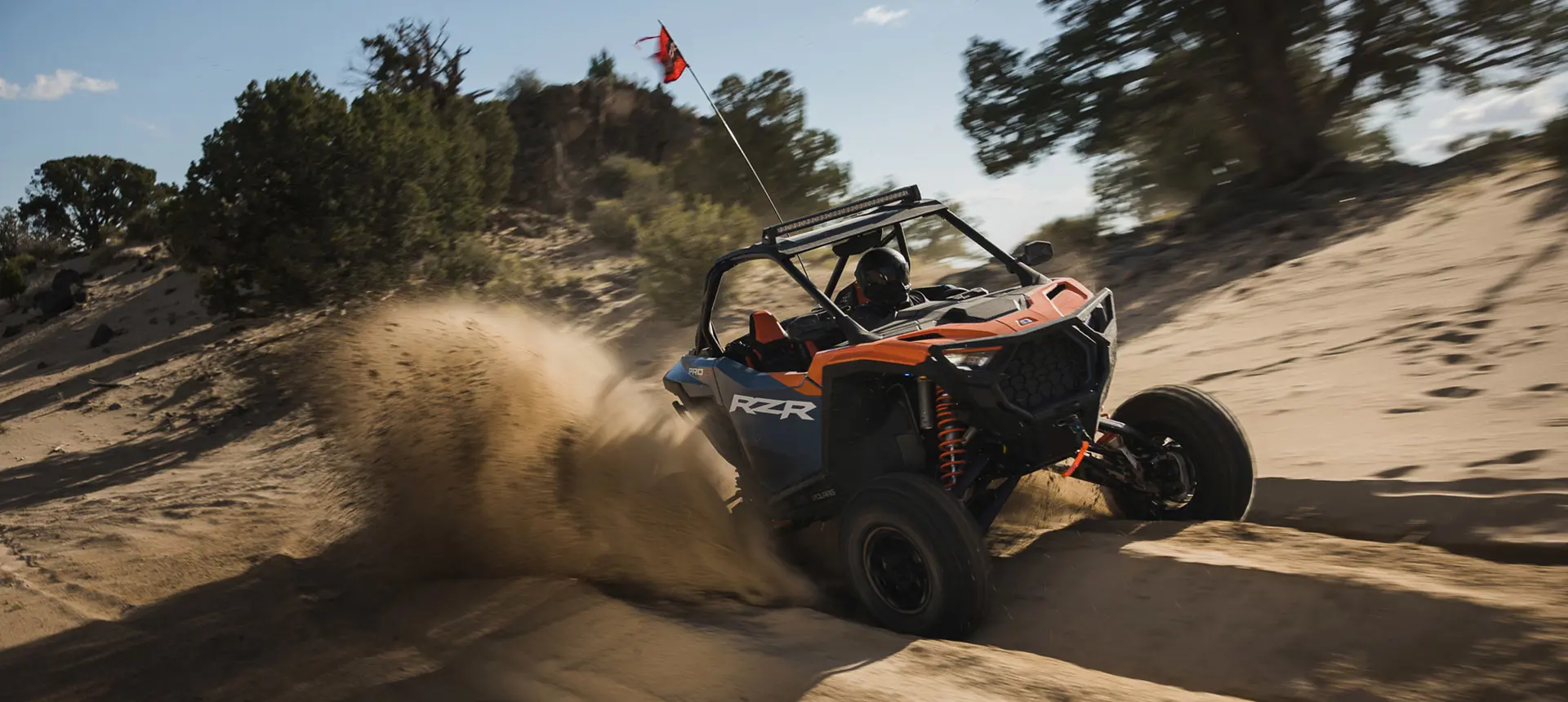 Polaris RZR Pro S side-by-side cruising down a desert trail.