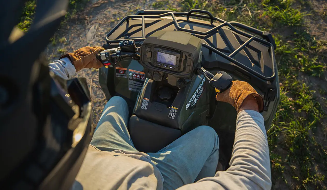 Dash on the steering of a Polaris Sportsman 450 ATV.