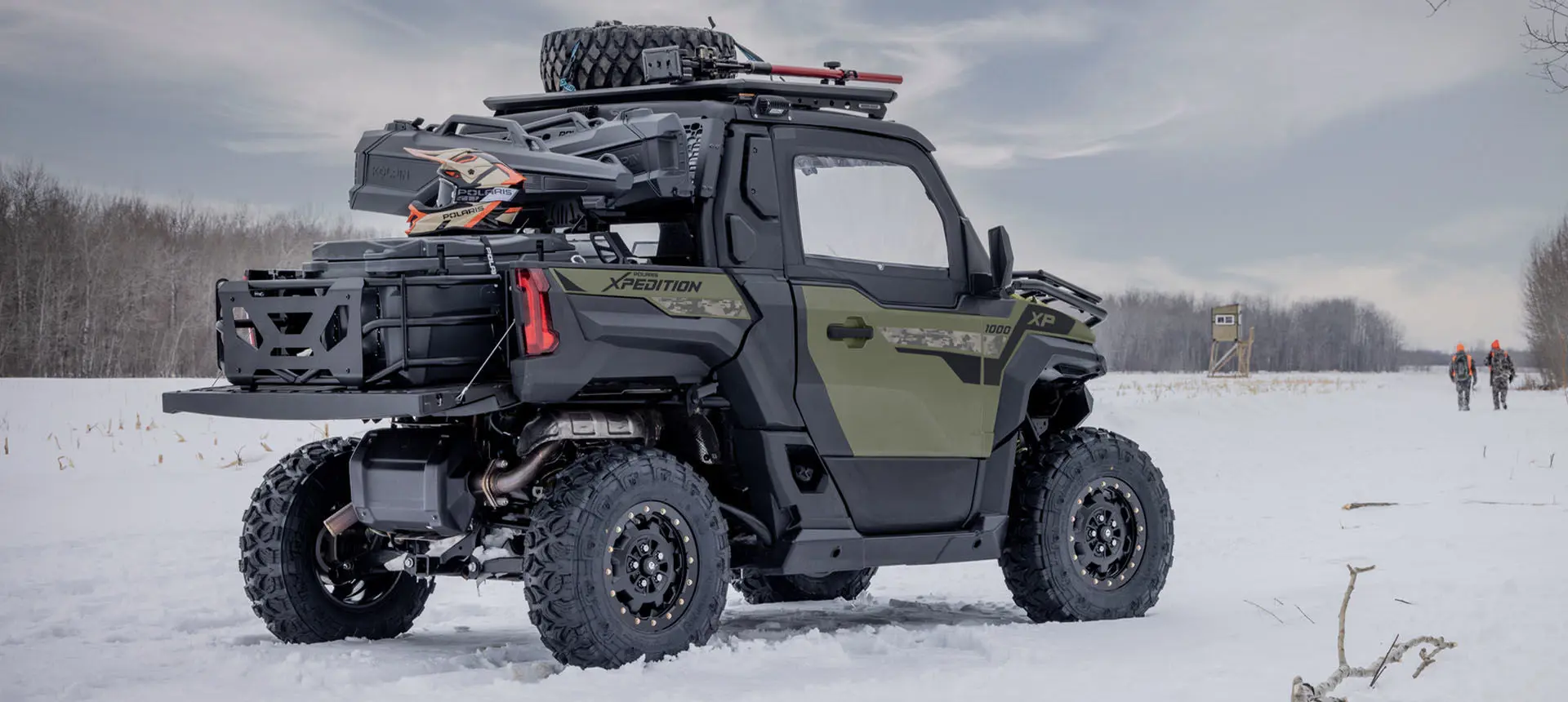 Side profile of a Polaris XPEDITION XP side-by-side with hunting accessories installed.