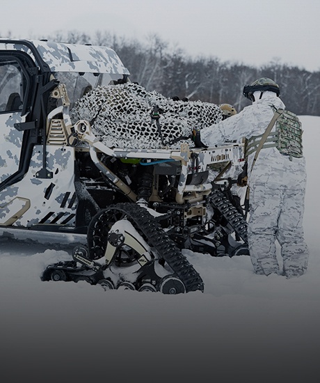 Military Tactical side-by-side with tracks used in the winter for logistics.