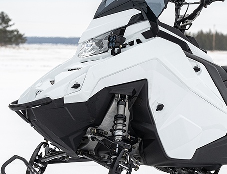 White panels on a Polaris Military 850 TITAN 155 snowmobile.