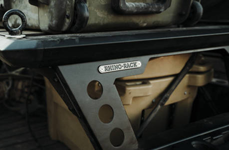 A Polaris RANGER 1000 UTV with Rhino-Rack storage rack installed over the cargo box.
