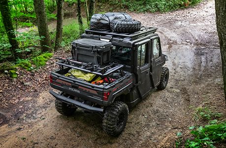 A Polaris RANGER CREW XP 1000 NorthStar Edition UTV with storage rack accessories installed.