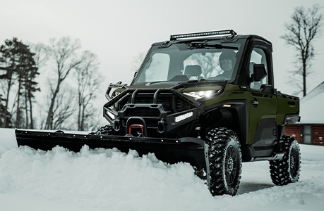 Polaris RANGER XD 1500 extreme duty UTV with a plow system installed.