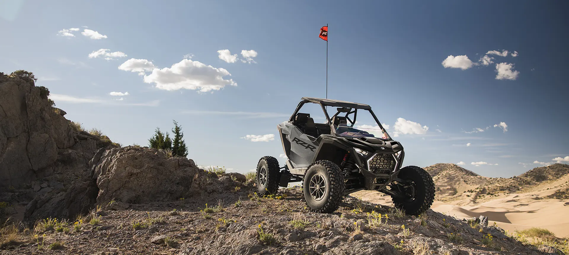 Polaris RZR Pro S side-by-side parked on a rocky hill in the desert.