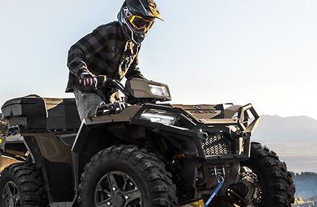 A Polaris Sportsman 850 ATV with front brushguard accessory installed.