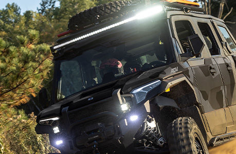 A Polaris XPEDITION ADV NorthStar with lighting accessories installed.