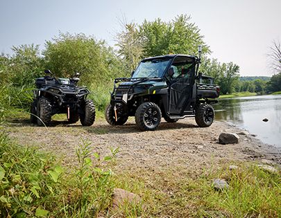 Polaris RANGER UTV and ATV with Government & Defense packages installed.