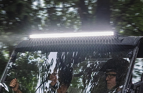 A Polaris RANGER 500 UTV with lighting accessories installed.