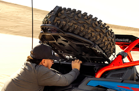 Spare Tire Carrier installed on a Polaris RZR Pro R side-by-side.