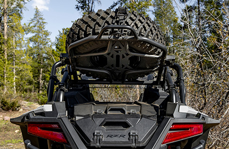 A Polaris RZR Pro S with spare tire carrier accessory installed. 