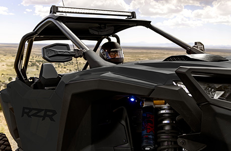 A Polaris RZR Pro S with lighting accessories installed.
