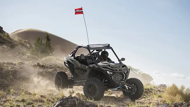 Polaris RZR Pro S side-by-side throwing sand in the desert.
