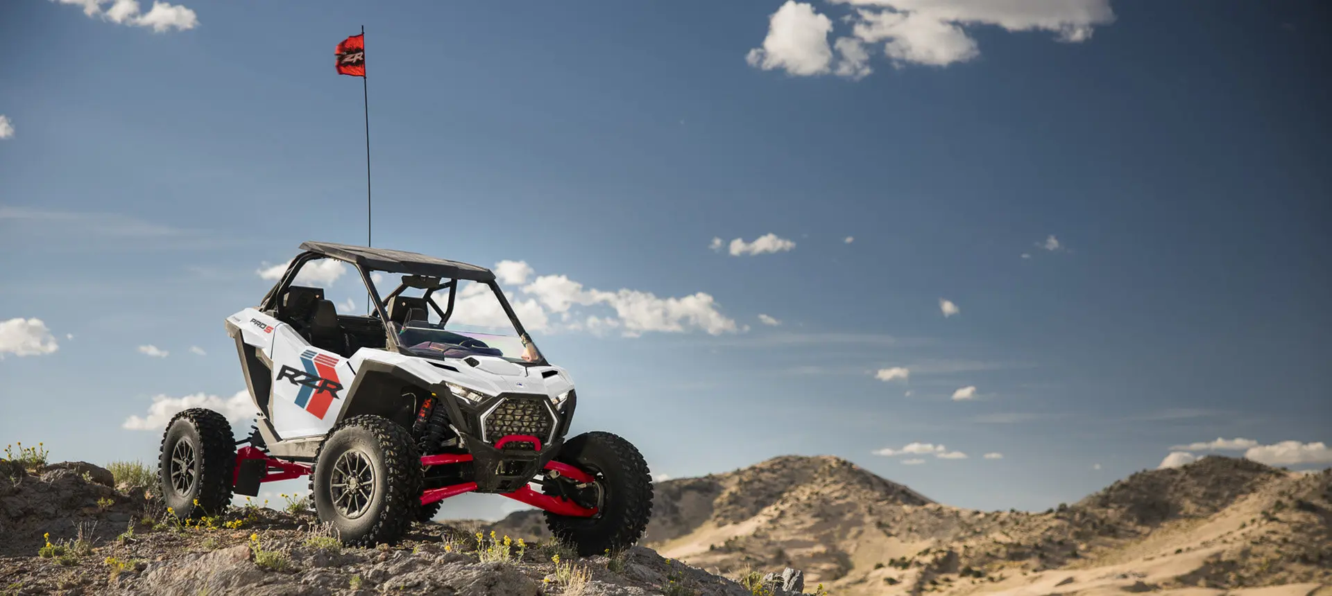 Polaris RZR Pro S side-by-side parked on a rocky hill in the desert.