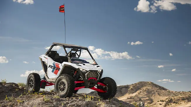 Polaris RZR Pro S side-by-side parked on a rocky hill in the desert.