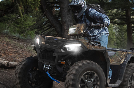 A Polaris Sportsman 850 ATV with front brushguard accessory installed.