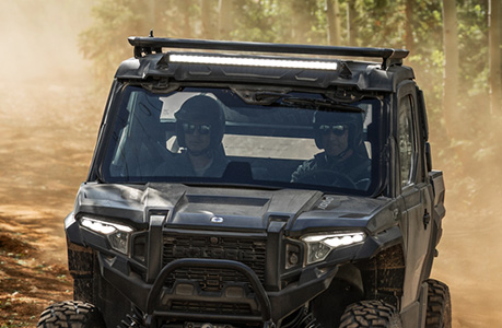 A Polaris XPEDITION performance side-by-side with lighting accessories installed. 