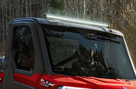 Polaris RANGER XP Kinetic with a lightbar accessory installed.
