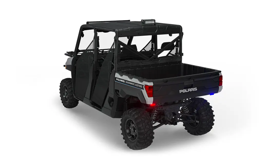 Rear view of a polaris ranger crew xp 1000 eps utv with the deluxe patrol package installed