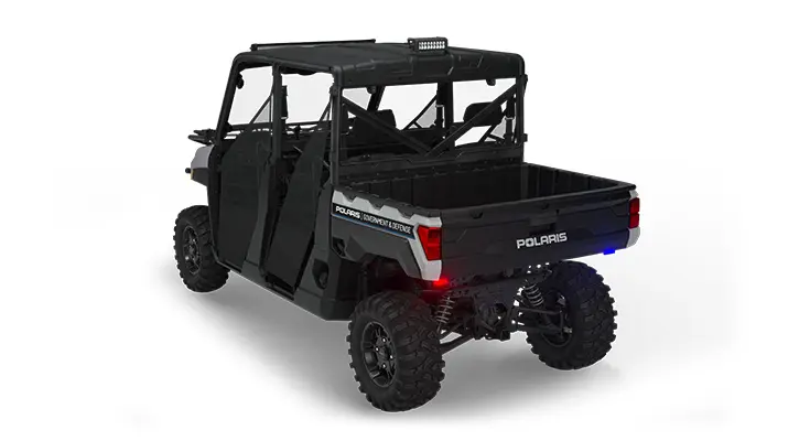 Rear view of a polaris ranger crew xp 1000 eps utv with the deluxe patrol package installed