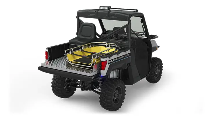 Rear side view of the cargo box with rescue skid and attendant seat on a polaris ranger xp 1000 eps utv with the deluxe rescue & patrol package installed