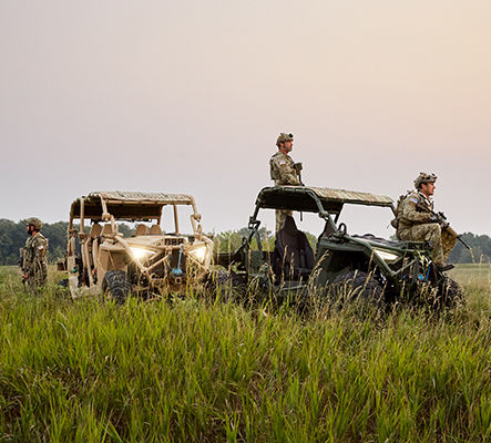 soldiers patrolling with polaris mrzr tactical vehicles