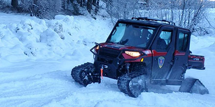 Chalan Fire Department Polaris Ranger with tracks on the snow