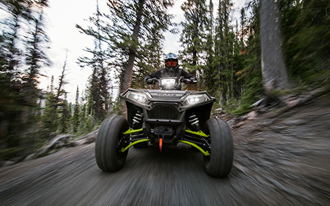 Front view of a Polaris Sportsman while trailing