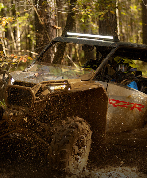 Explore Polaris vehicles for mudding.
