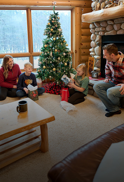 A family open their presents about off roading in Christmas's Eve.