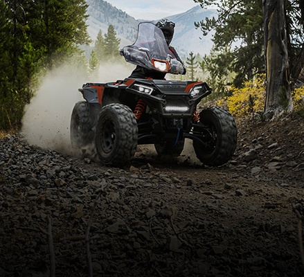Person taking a tight corner with ease on a 2026 sport ATV.