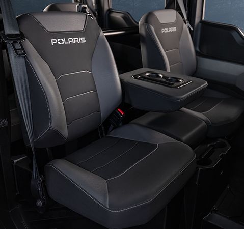 Interior cab view showcasing the plush comfort and amenities in a NorthStar enclosed cab UTV.