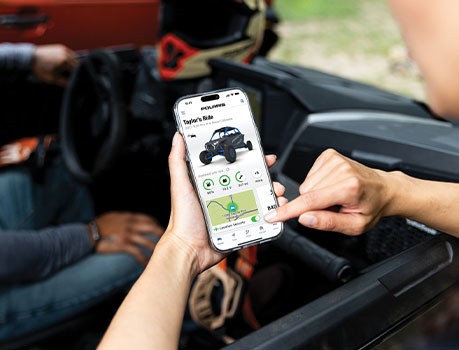 PRIDE COMMAND+ being used on a smart phone to track vehicle data.
