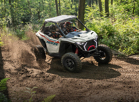 A driver in a Polaris RZR showcasing the precision handling. 