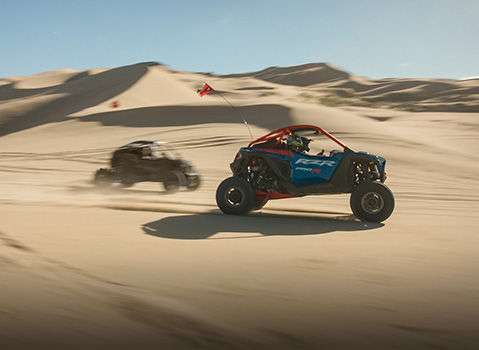 2 RZR side-by-sides showcasing the pitch control feature.